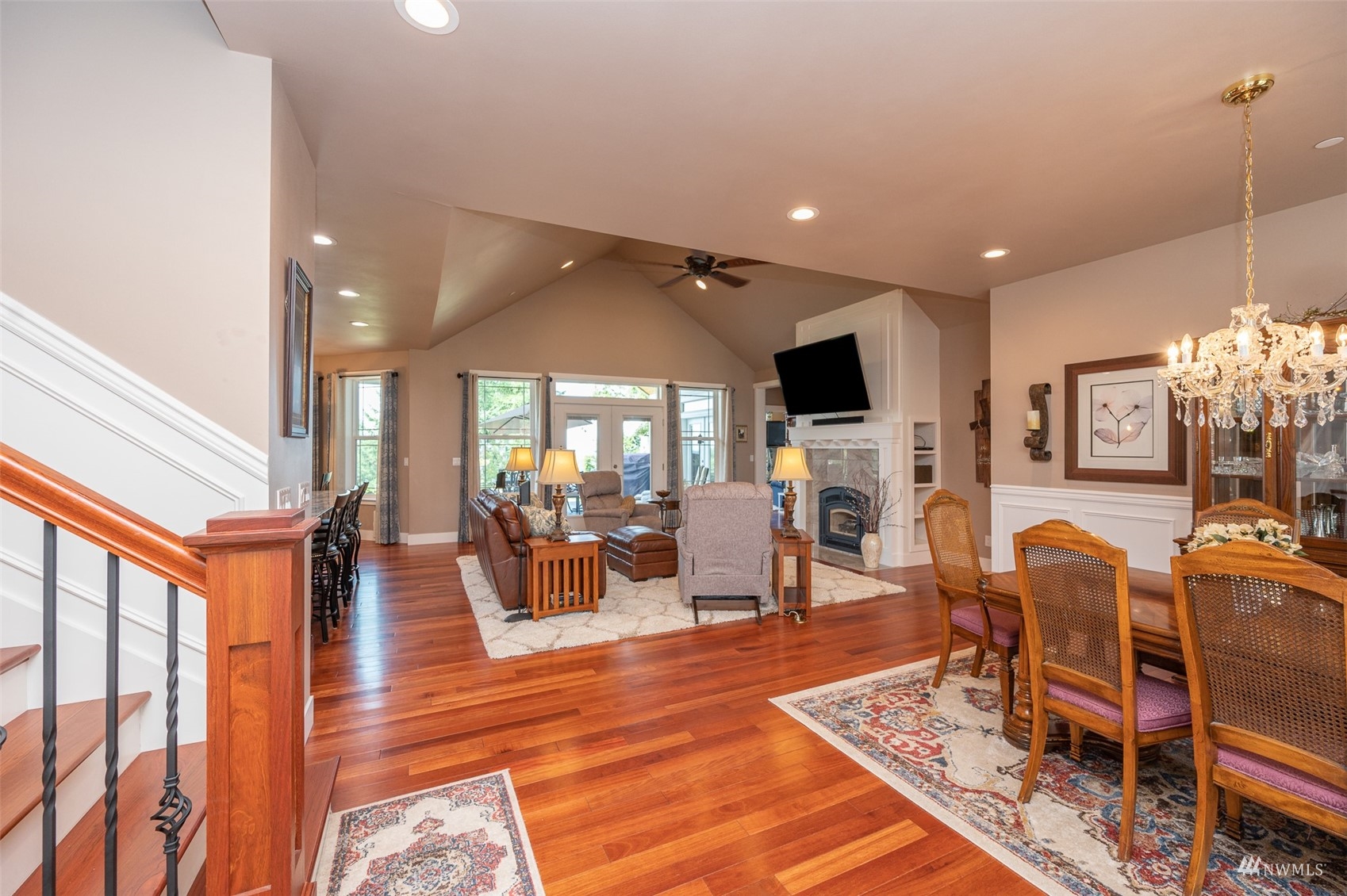 25920 80th Avenue East Graham, WA 98338 - Photo 3 of 40 a living room with furniture a fireplace and a flat screen tv
