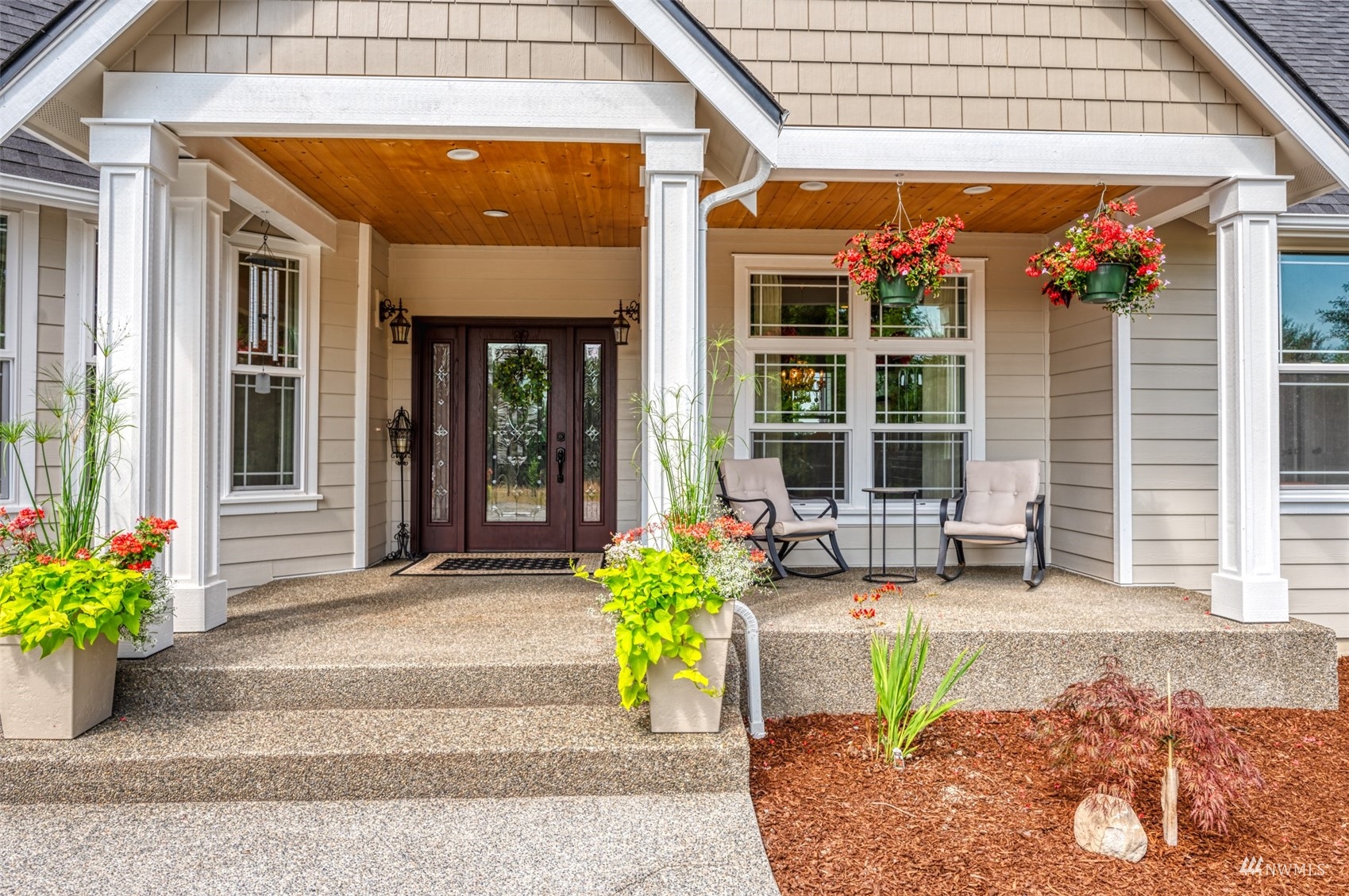 25920 80th Avenue East Graham, WA 98338 - Photo 40 of 40 a front view of a house with potted plants