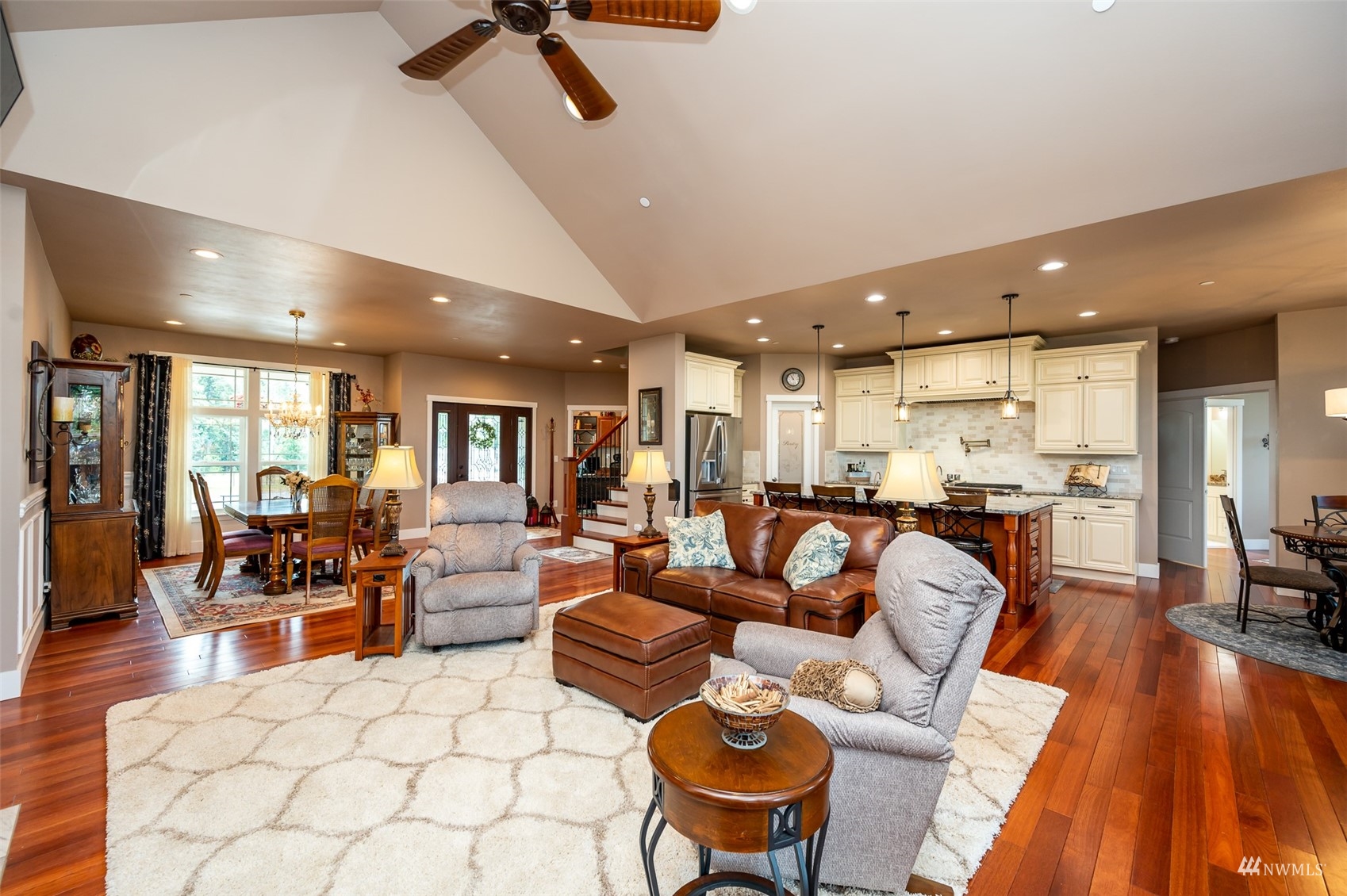 25920 80th Avenue East Graham, WA 98338 - Photo 4 of 40 a living room with furniture and kitchen view