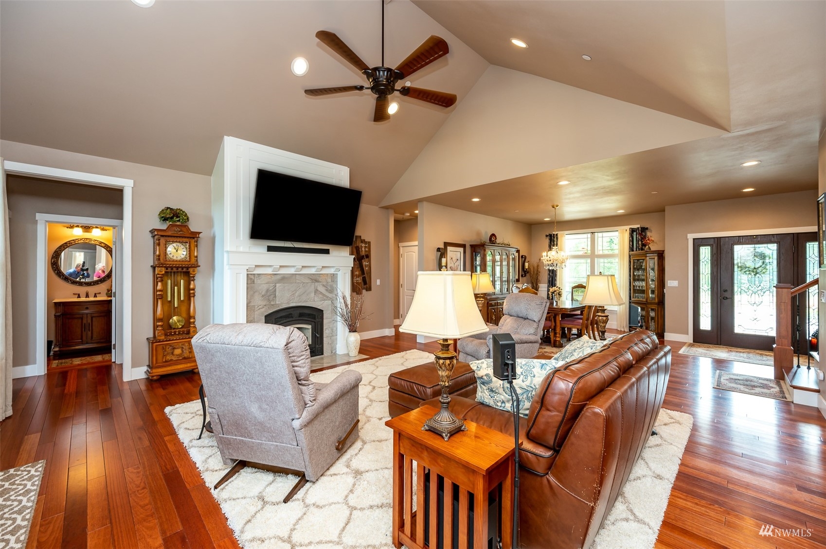 25920 80th Avenue East Graham, WA 98338 - Photo 5 of 40 a living room with fireplace furniture and a flat screen tv
