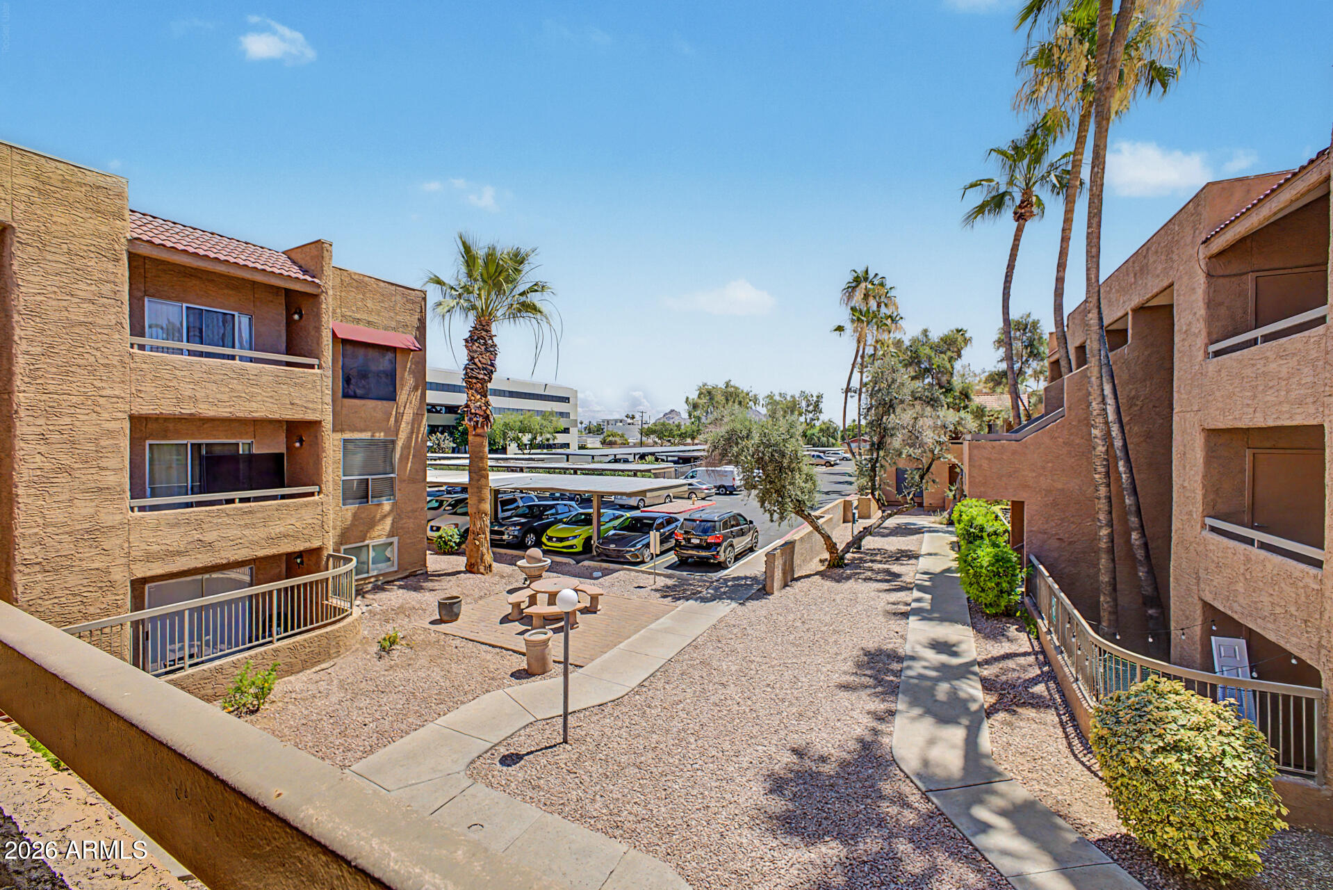 2625 East Indian School Road, Unit 227 Phoenix, AZ 85016 - Photo 22 of 31 a view of a chairs and tables in the patio