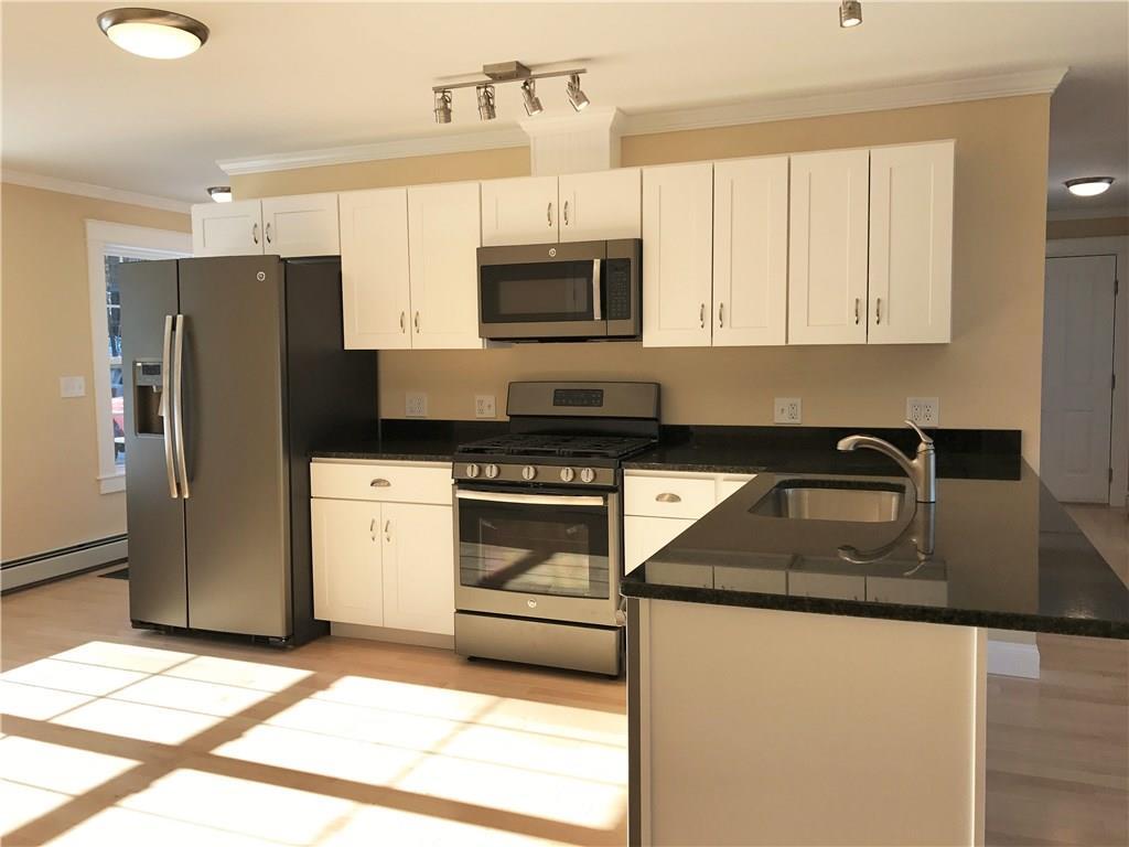 51 Dr Mann Road Augusta, ME 04330 - Photo 3 of 35 The kitchen features granite...