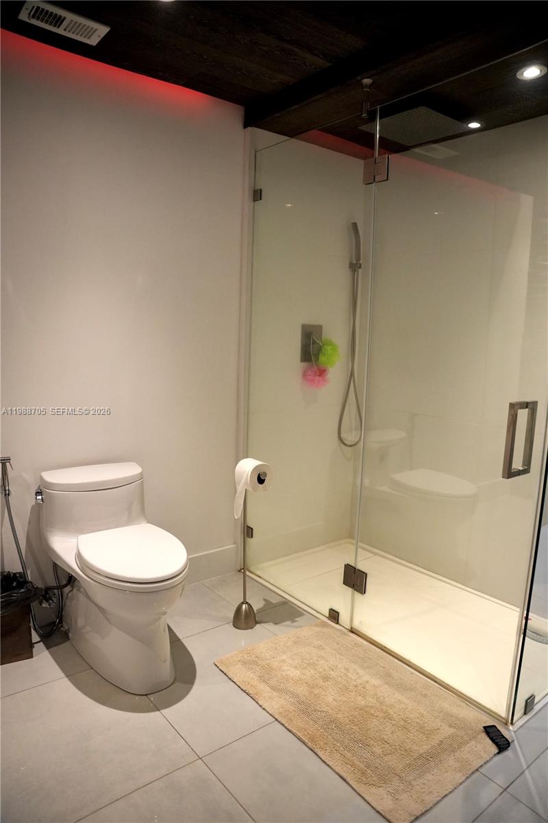19262 Northwest 89th Avenue Hialeah, FL 33018 - Photo 11 of 20 a bathroom with a sink and a toilet