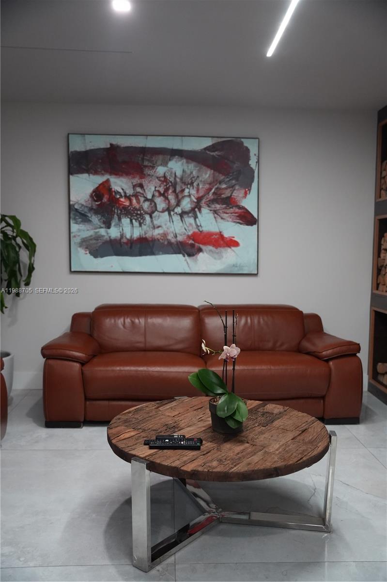 19262 Northwest 89th Avenue Hialeah, FL 33018 - Photo 18 of 20 a living room with furniture rug and couch