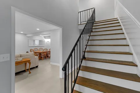 a view of entryway livingroom and hall