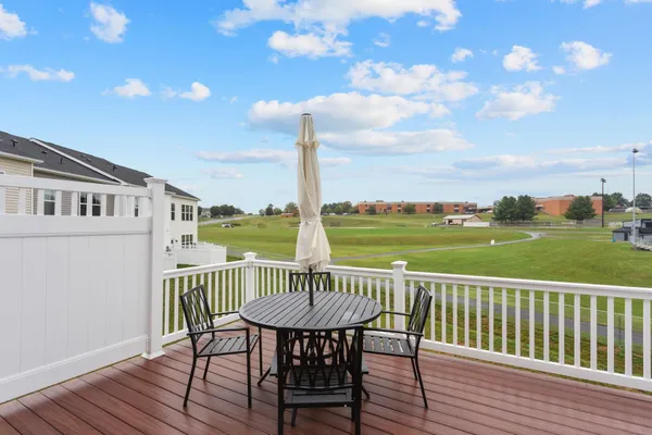 a view of a balcony with a patio