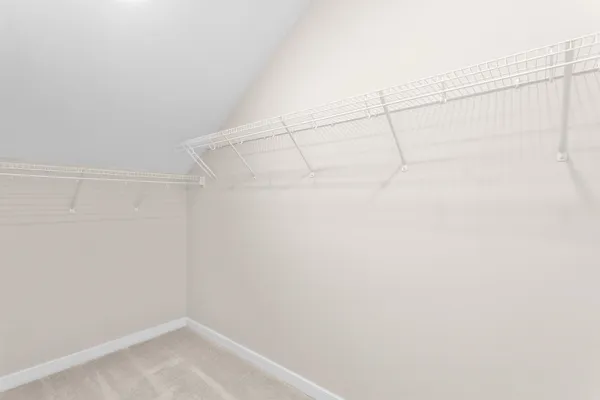 a view of a room with racks on the wall