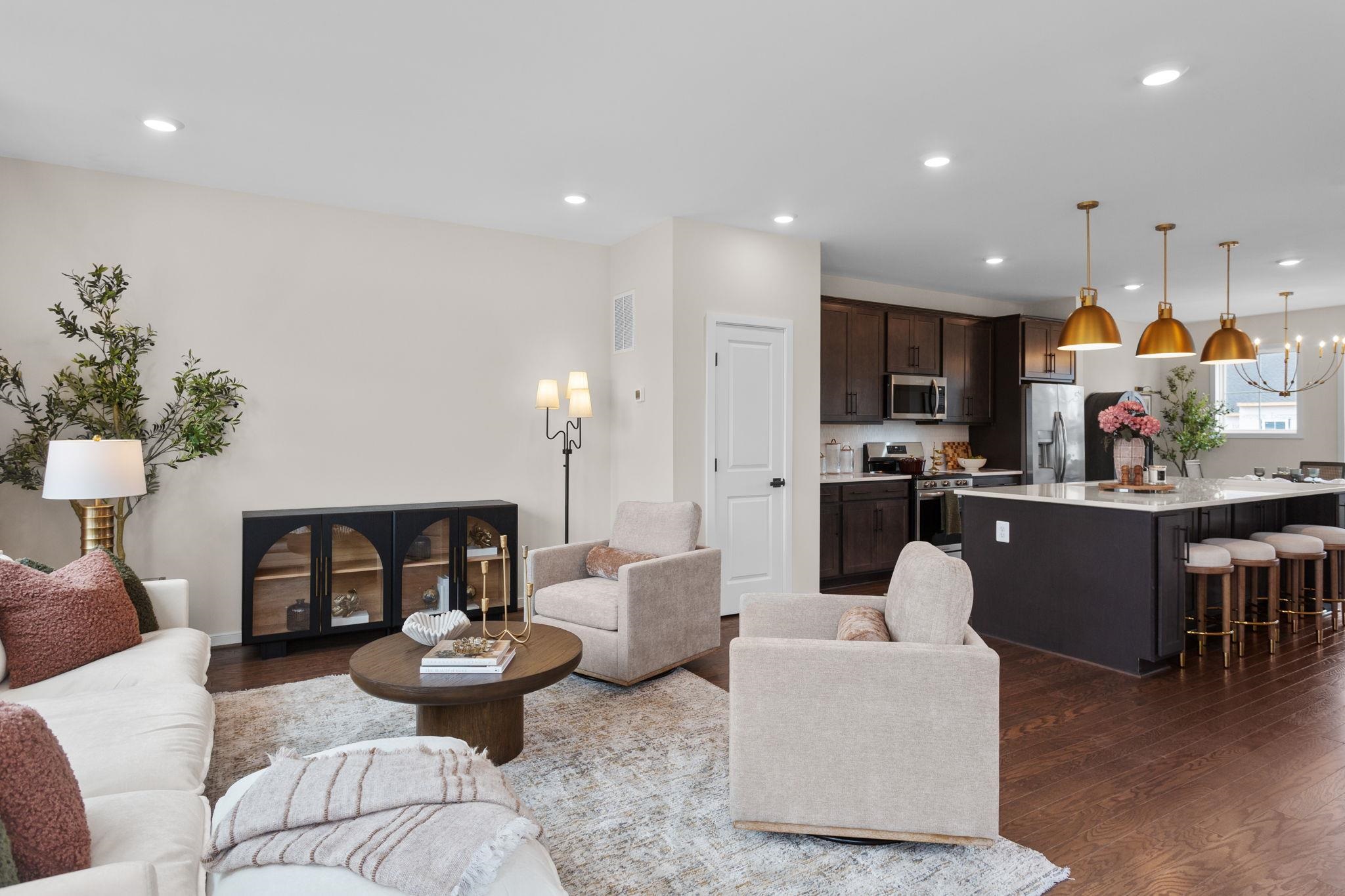207 Scarlet Maple Lane, Unit 119 Bridgewater, VA 22812 - Photo 10 of 27 a living room with furniture and kitchen view