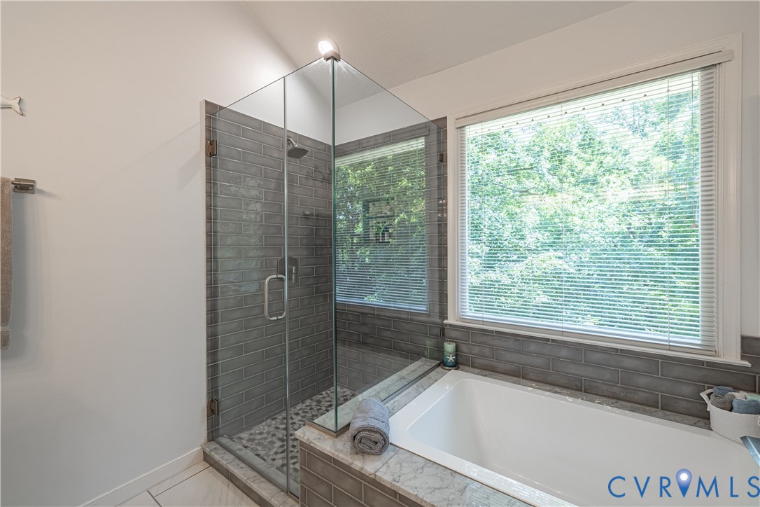 4501 Foxwood Road Chester, VA 23831 - Photo 23 of 42 Spacious bathroom featuring a glass-enclosed showe