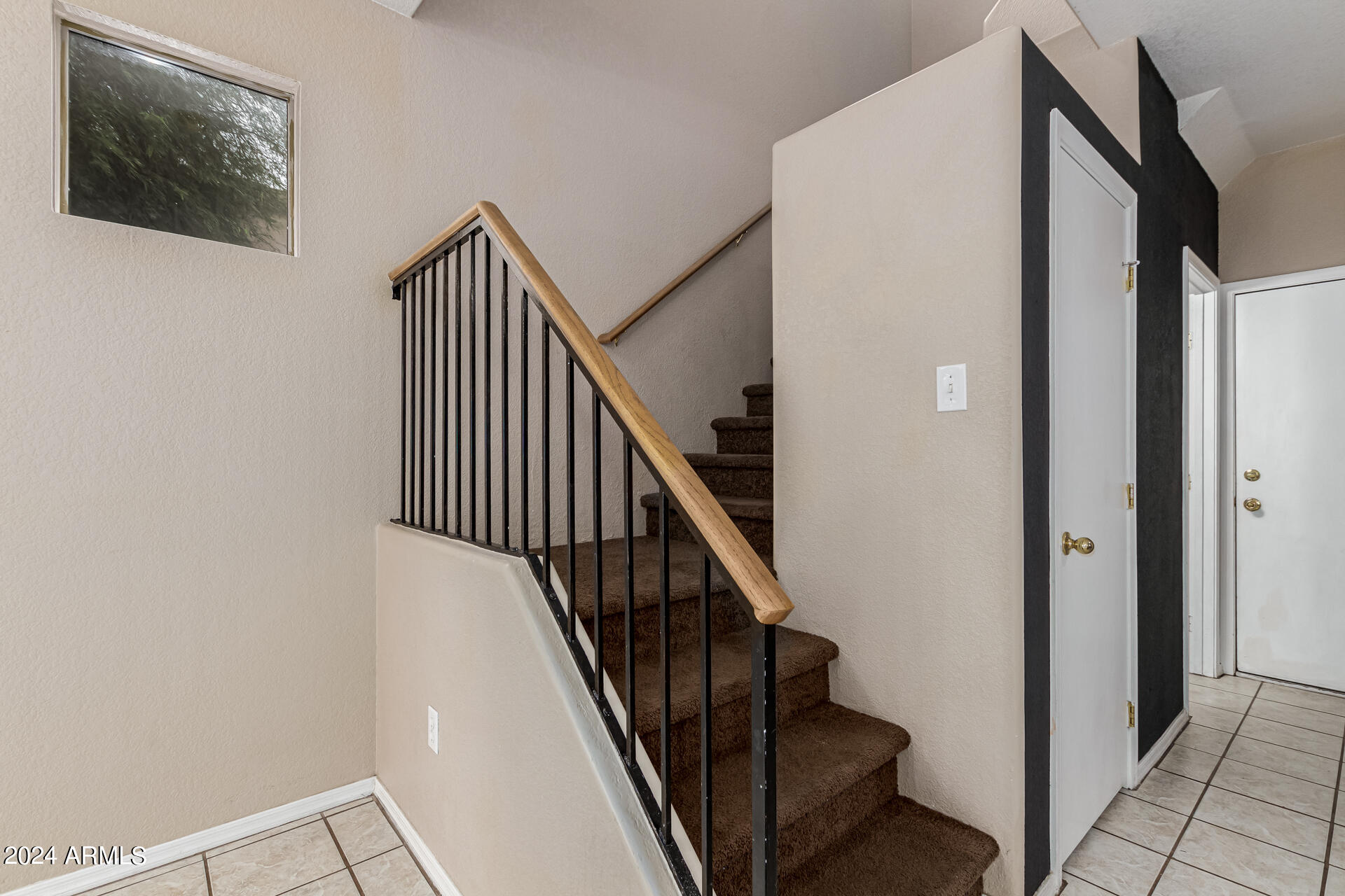 1371 South Boulder Street, Unit A Gilbert, AZ 85296 - Photo 14 of 43 a view of a hallway with staircase