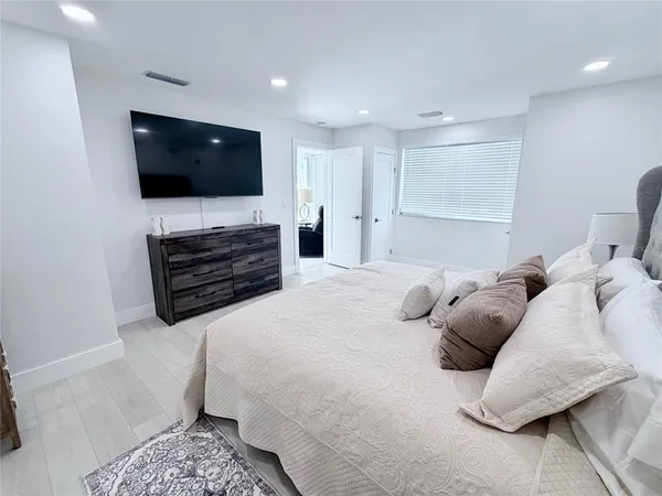 a view of swimming pool with seating space