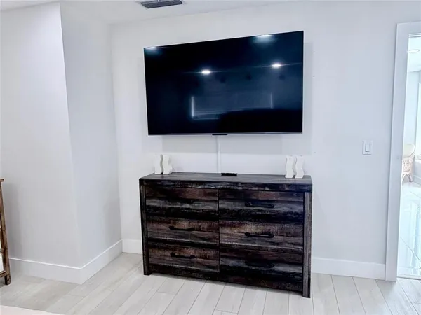 a view of a street with trees