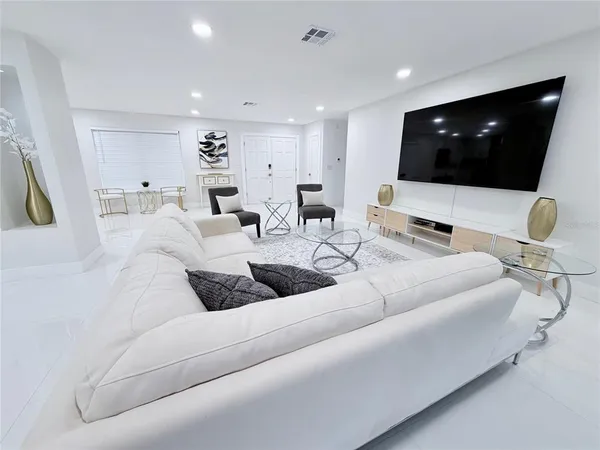 a view of a workspace with furniture