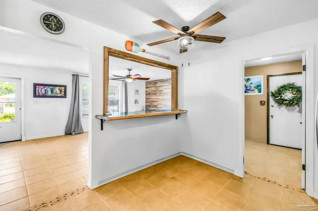 a view of a hallway with a large window