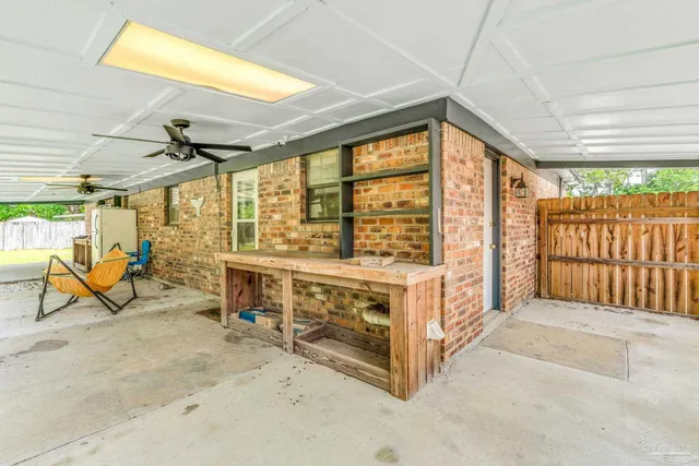 a view of a house with pool and garden
