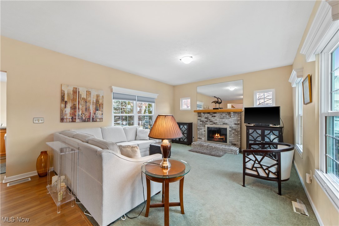 4461 Sexton Road Cleveland, OH 44105 - Photo 2 of 47 Living room with a fireplace and baseboards
