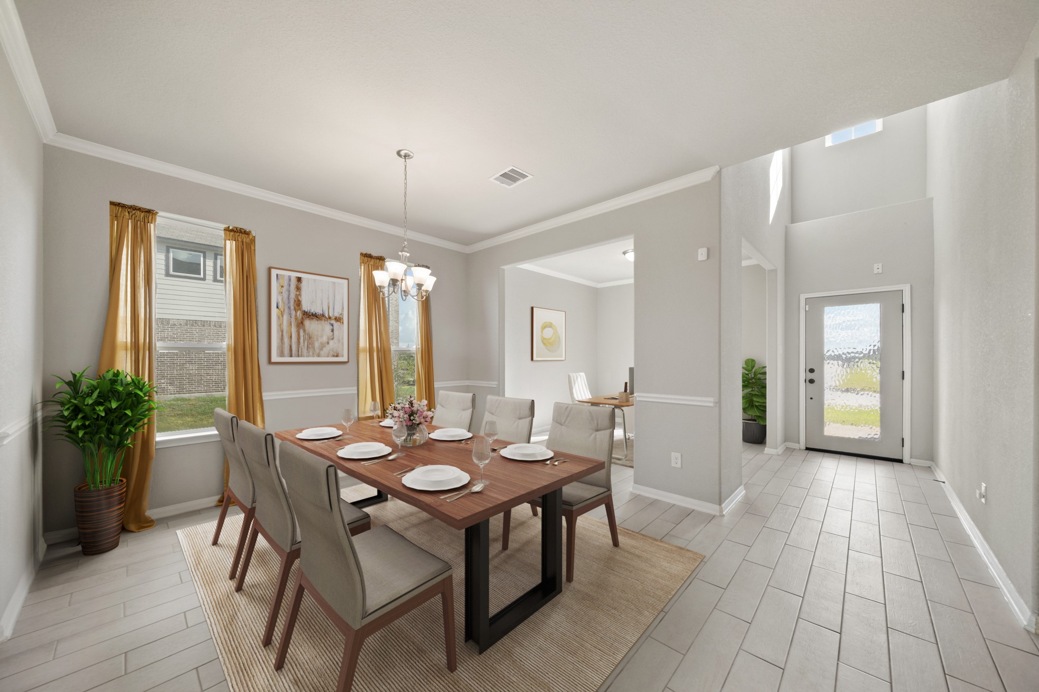 8802 Mallow Rose Way Rosharon, TX 77583 - Photo 9 of 29 Virtually Staged: This formal dining room features crown molding details, a pendant lighting, tile floors, and large windows. It has immediate access to the kitchen as well.