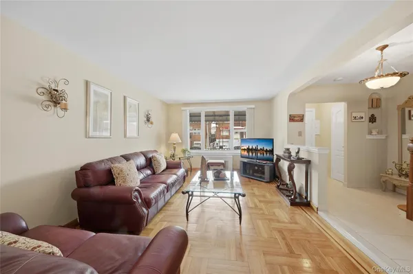 a living room with furniture and a table