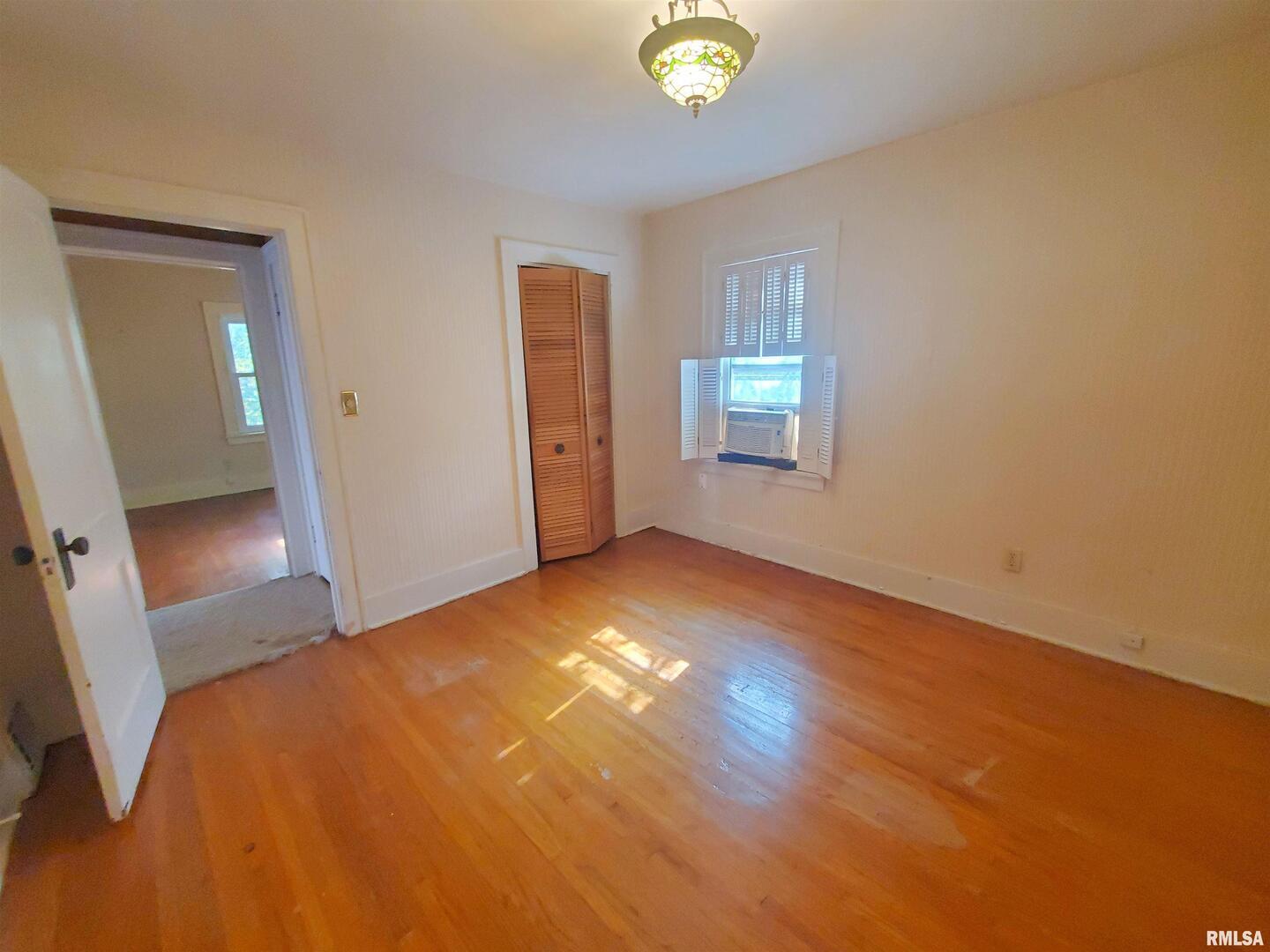1182 25th Street Moline, IL 61265 - Photo 15 of 17 a view of empty room with window