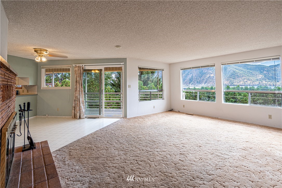 755 Wapato Way Manson, WA 98831 - Photo 11 of 40 a view of a room with a large window