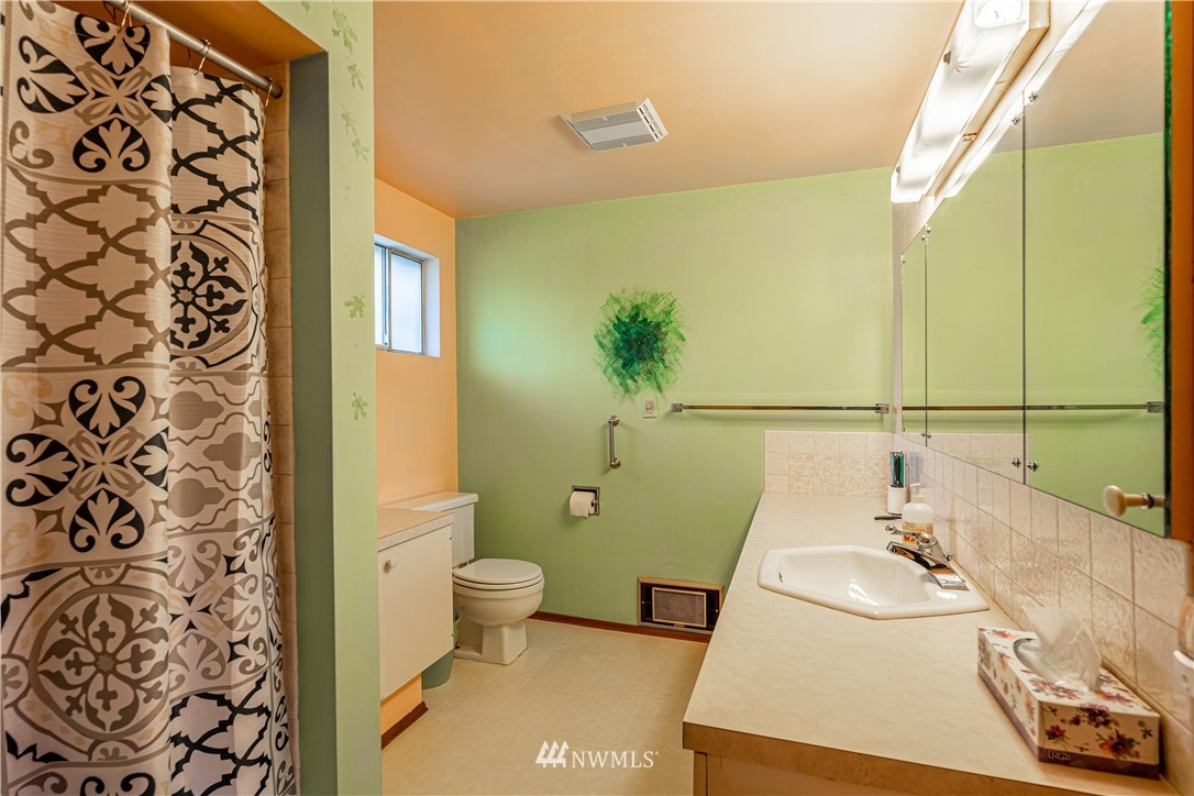 755 Wapato Way Manson, WA 98831 - Photo 20 of 40 a bathroom with a sink and a mirror