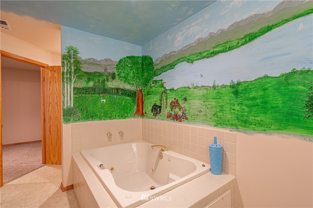 755 Wapato Way Manson, WA 98831 - Photo 24 of 40 a white bath tub sitting in a backyard