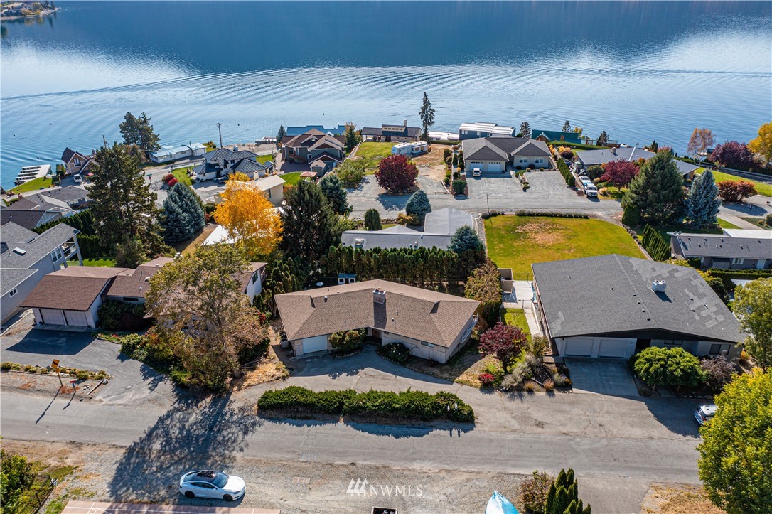 755 Wapato Way Manson, WA 98831 - Photo 4 of 40 a view of a house with a yard