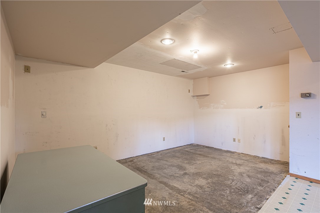 755 Wapato Way Manson, WA 98831 - Photo 31 of 40 an empty room with an empty space