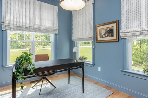 a room with furniture and a window