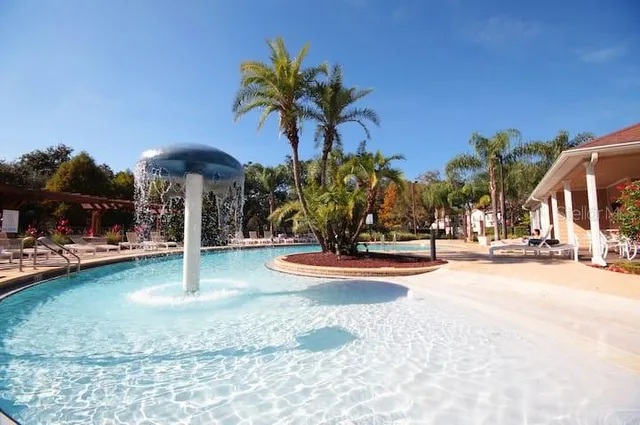 a view of a yard with palm tree