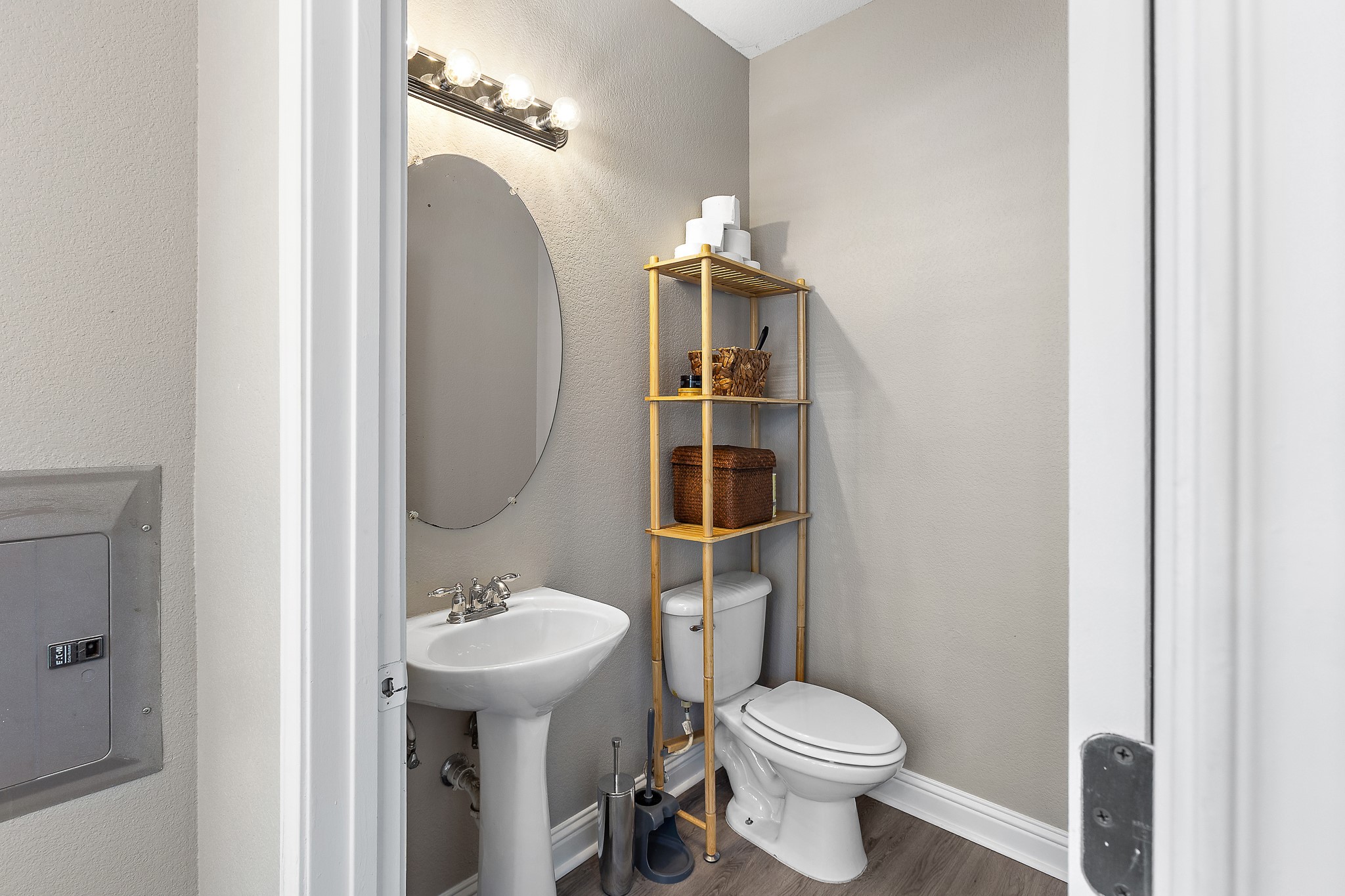 914 Bret Lane Austin, TX 78721 - Photo 14 of 33 a bathroom with a toilet sink and mirror