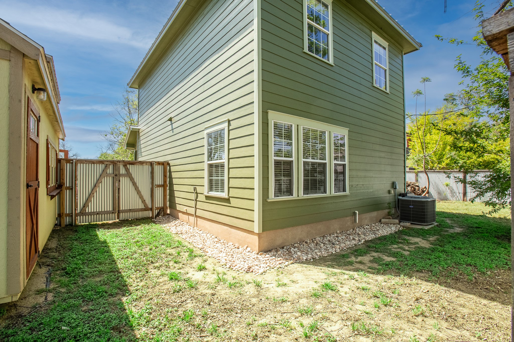 914 Bret Lane Austin, TX 78721 - Photo 26 of 33 a view of a house with backyard and sitting area