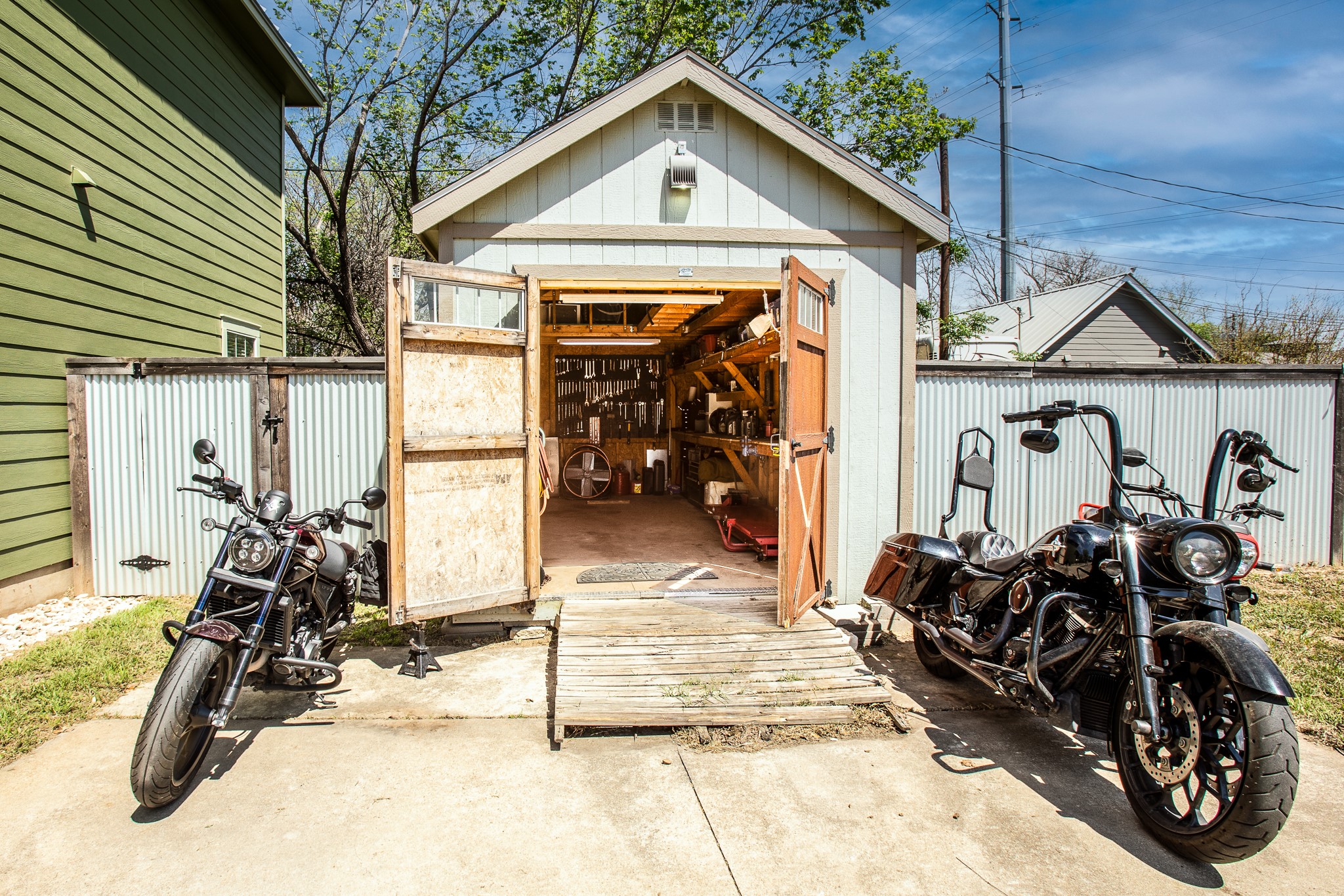 914 Bret Lane Austin, TX 78721 - Photo 6 of 34 a view of a garage with rack and bicycle