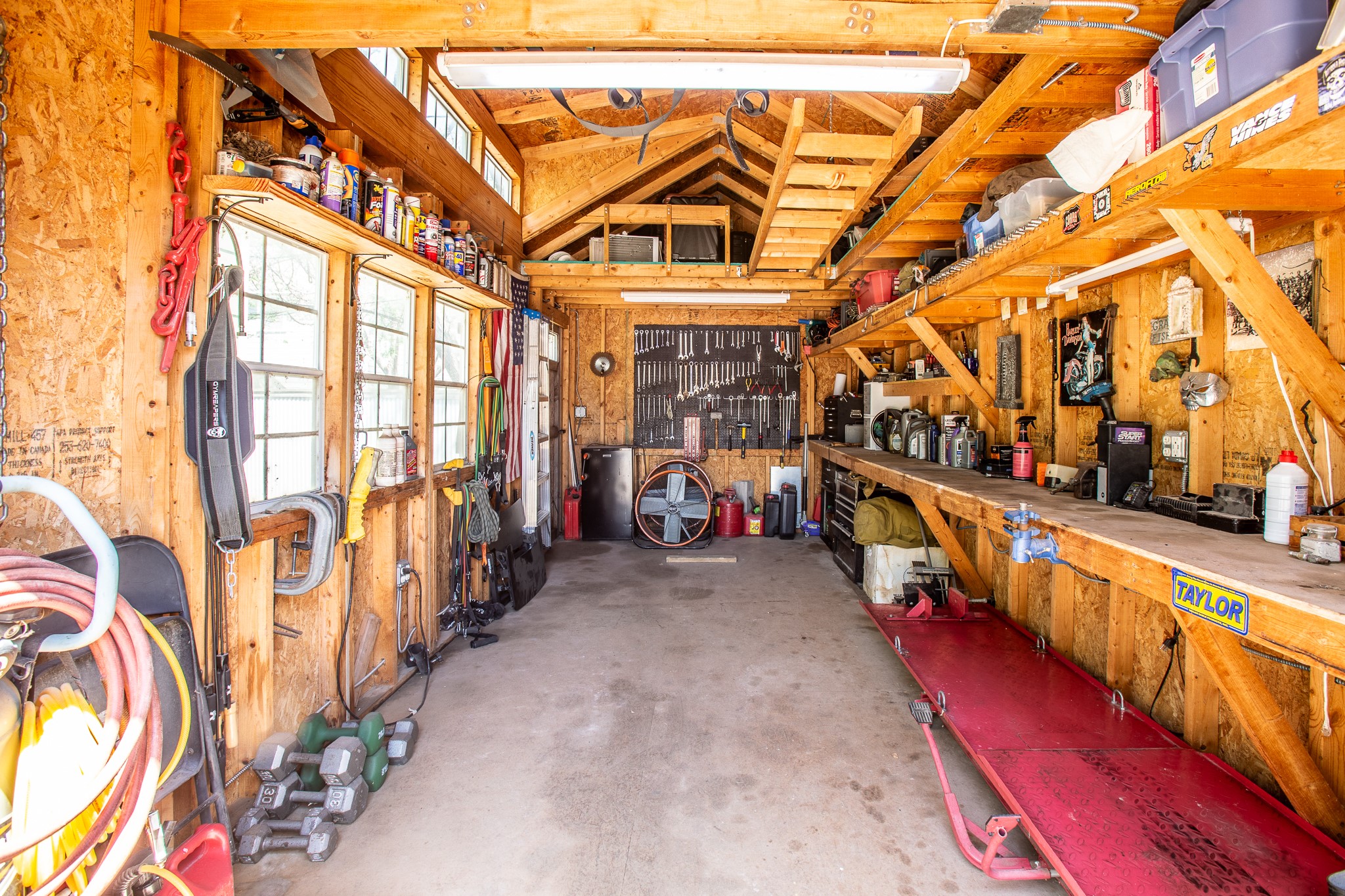 914 Bret Lane Austin, TX 78721 - Photo 7 of 34 Inside motorcycle workshop