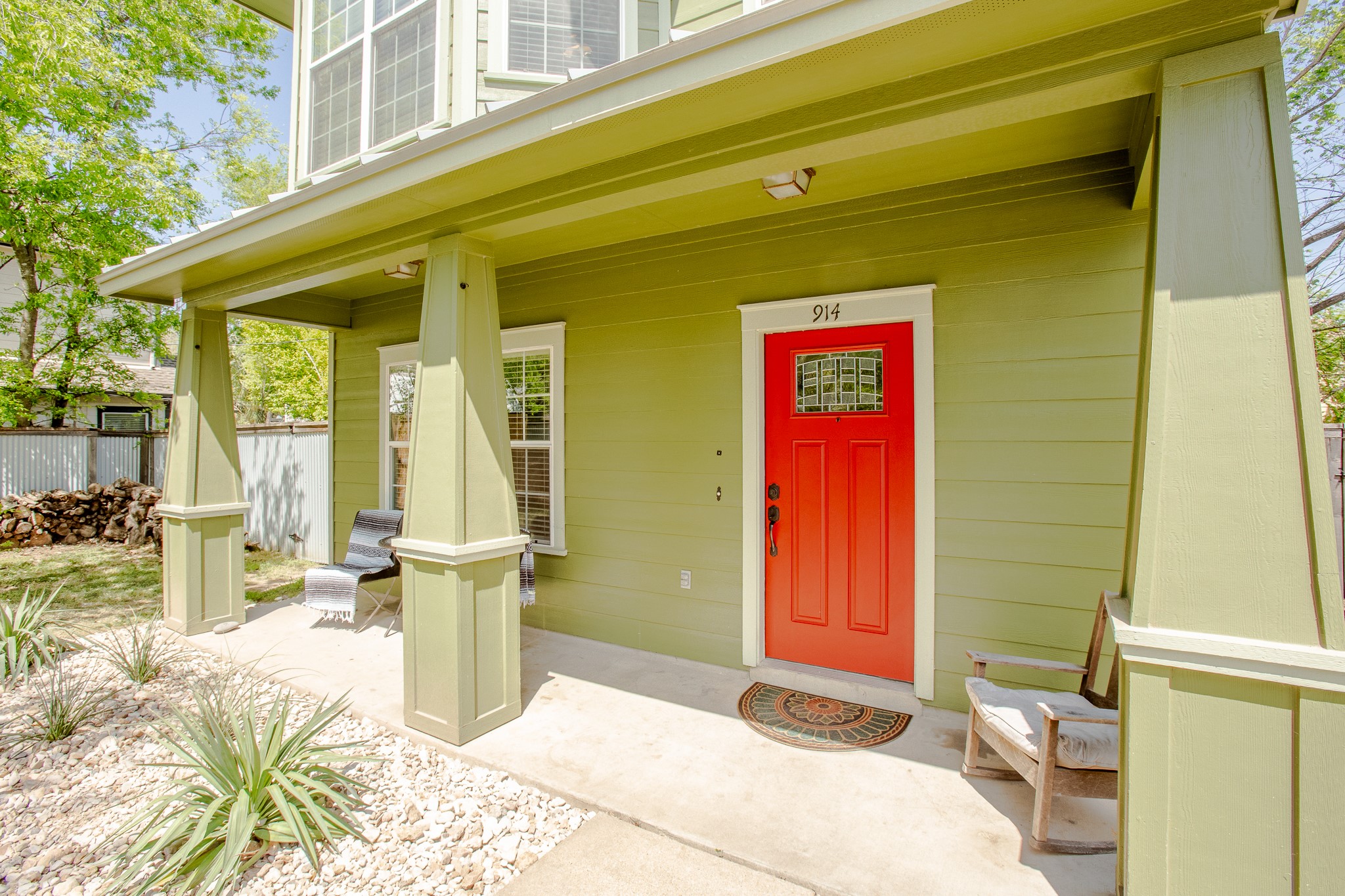 914 Bret Lane Austin, TX 78721 - Photo 8 of 34 a front view of a house with many windows