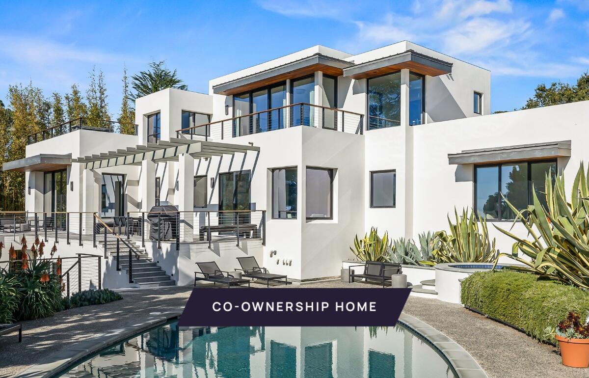 1131 Las Alturas Road, Unit SHARE A Santa Barbara, CA 93103 - Photo 1 of 32 a sign on a pole on a street