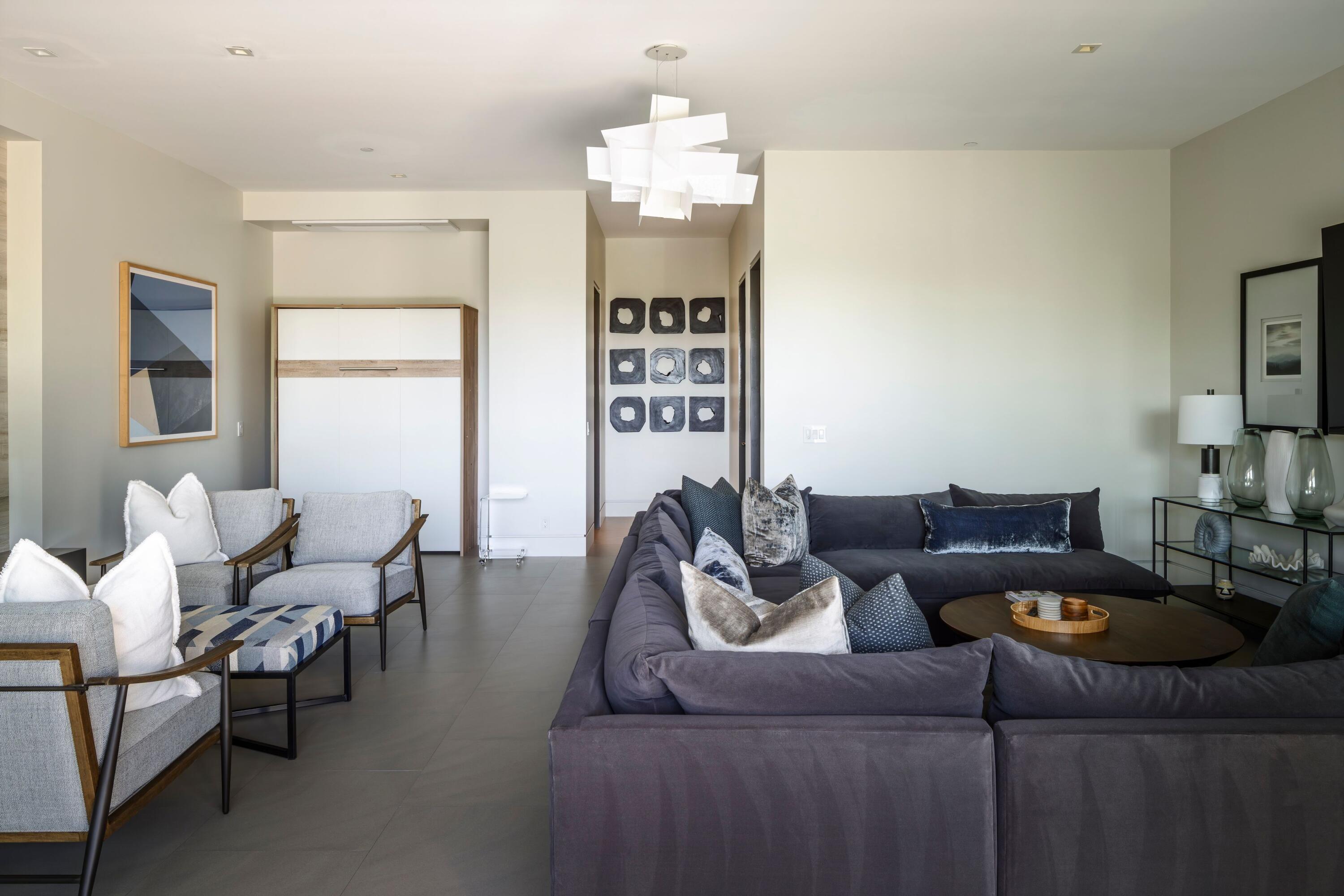 1131 Las Alturas Road, Unit A Santa Barbara, CA 93103 - Photo 16 of 47 a living room with furniture and a chandelier