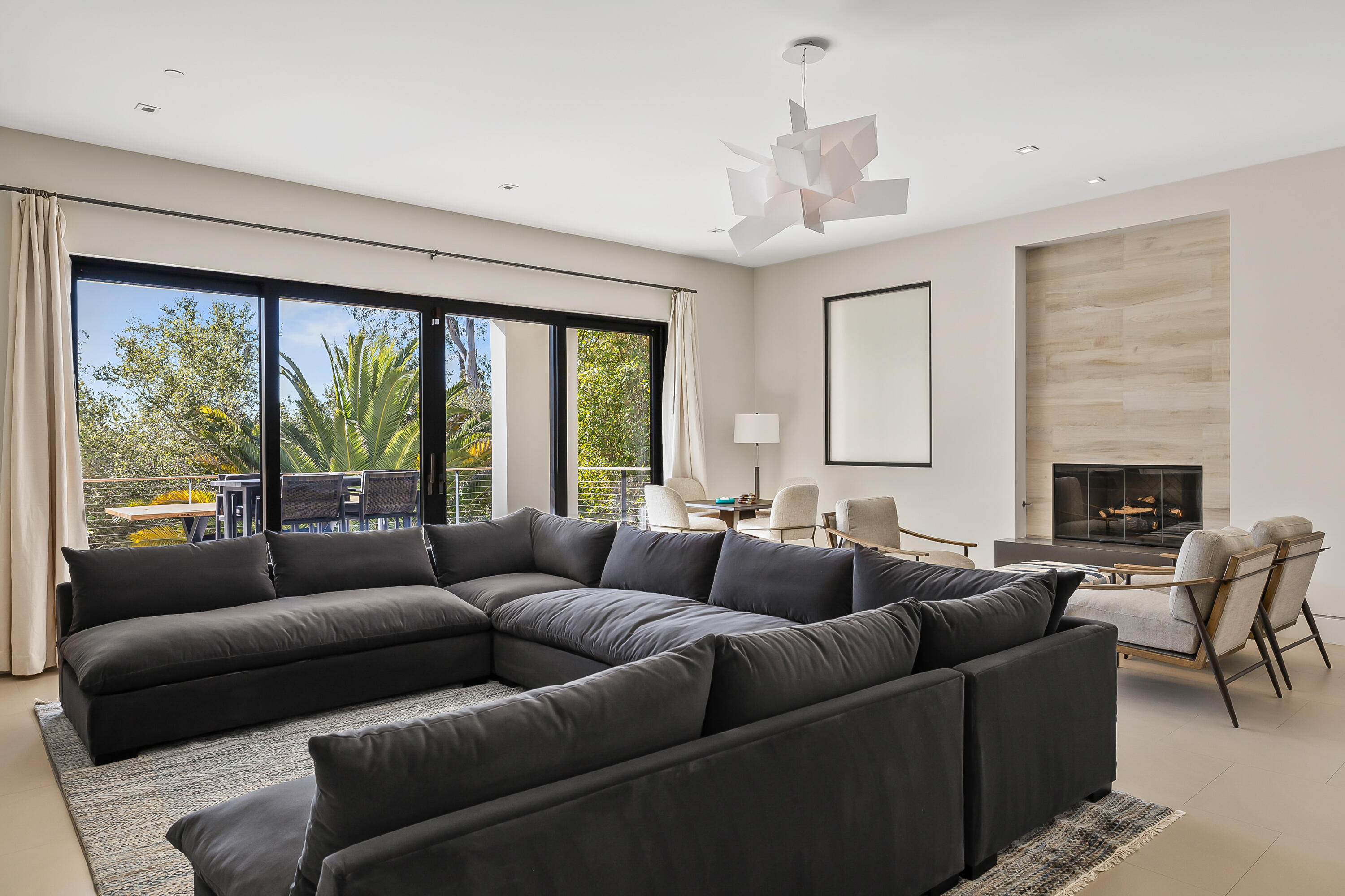 1131 Las Alturas Road, Unit SHARE A Santa Barbara, CA 93103 - Photo 16 of 32 a living room with furniture and a large window