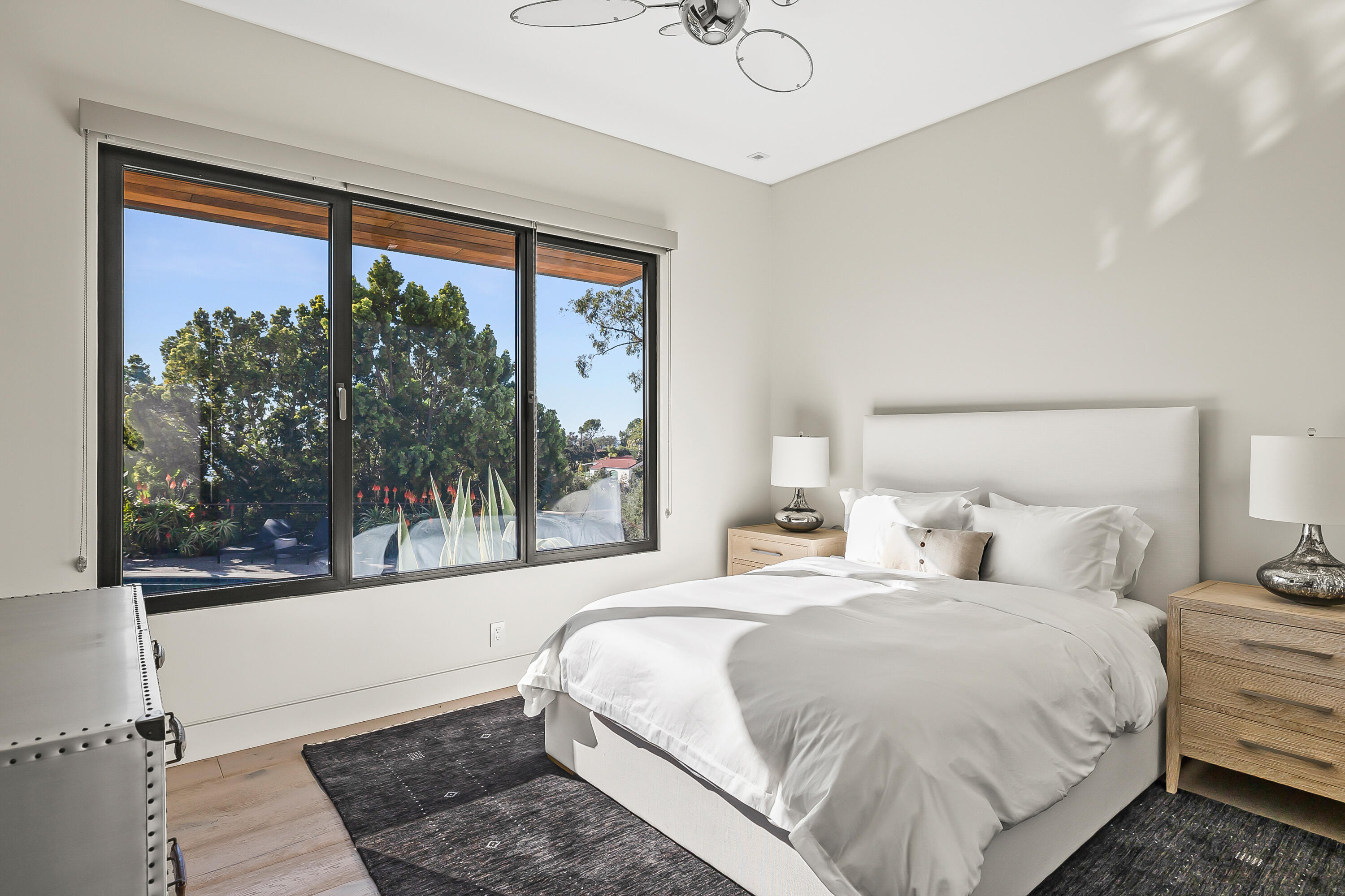 1131 Las Alturas Road, Unit SHARE A Santa Barbara, CA 93103 - Photo 19 of 32 a bedroom with a large bed and a window