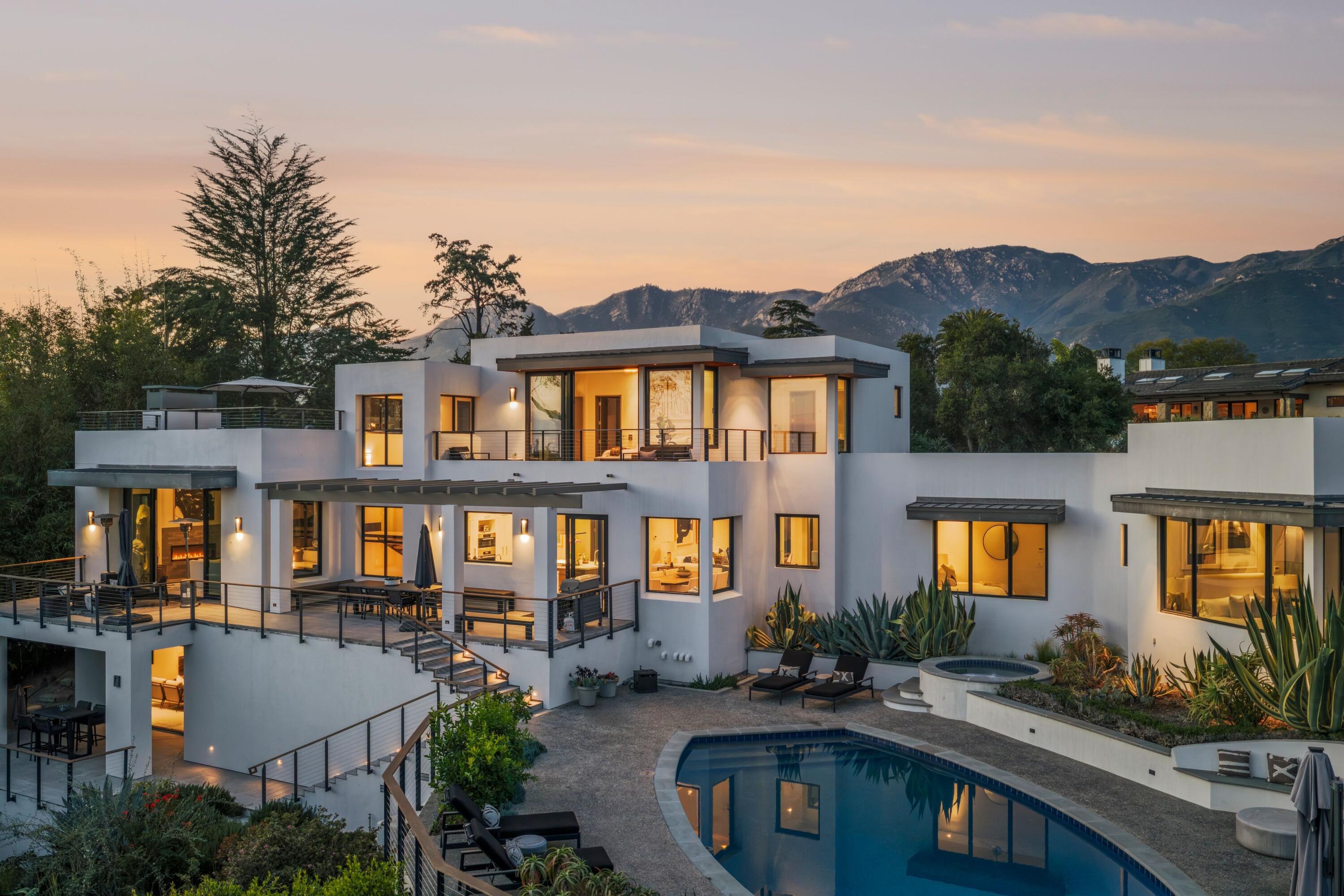 1131 Las Alturas Road, Unit A Santa Barbara, CA 93103 - Photo 2 of 47 1. Aerial Exterior at Dusk with Pool and