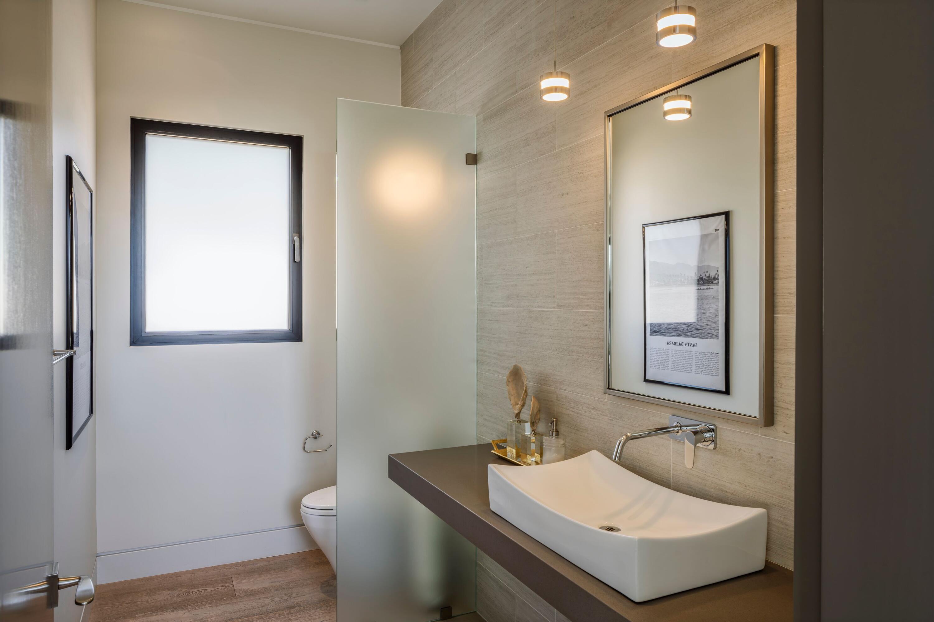 1131 Las Alturas Road, Unit A Santa Barbara, CA 93103 - Photo 27 of 47 a bathroom with a sink and a mirror