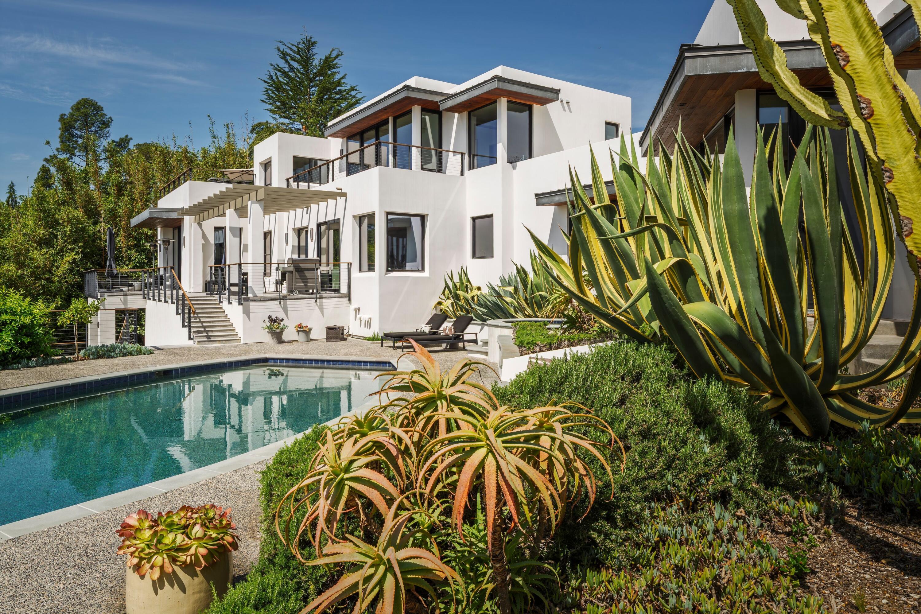 1131 Las Alturas Road, Unit A Santa Barbara, CA 93103 - Photo 33 of 47 a view of a house with a yard