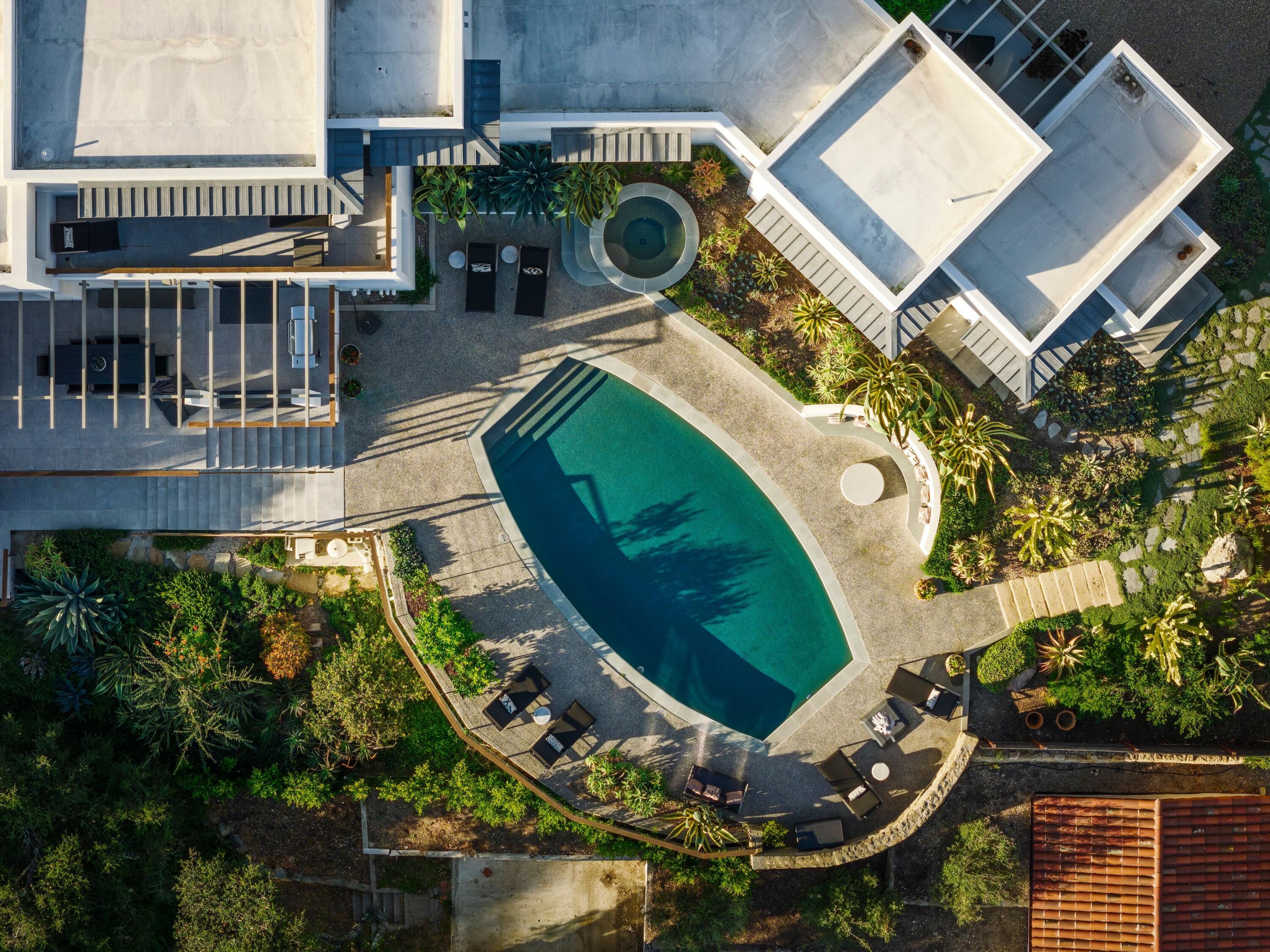 1131 Las Alturas Road, Unit A Santa Barbara, CA 93103 - Photo 34 of 47 an aerial view of a house with a swimming pool