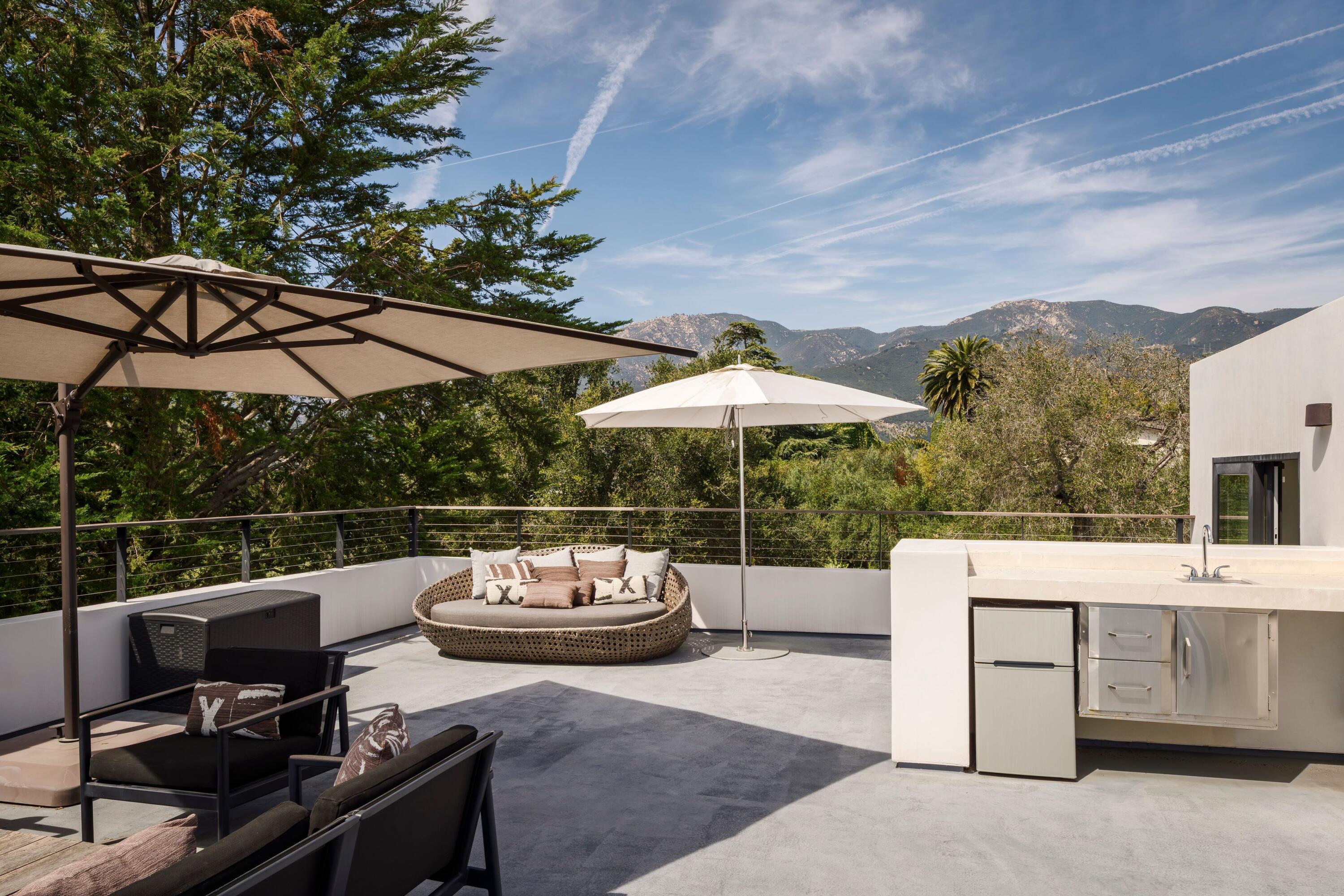 1131 Las Alturas Road, Unit A Santa Barbara, CA 93103 - Photo 40 of 47 39. Aerial View of Pool Deck and Rooftop