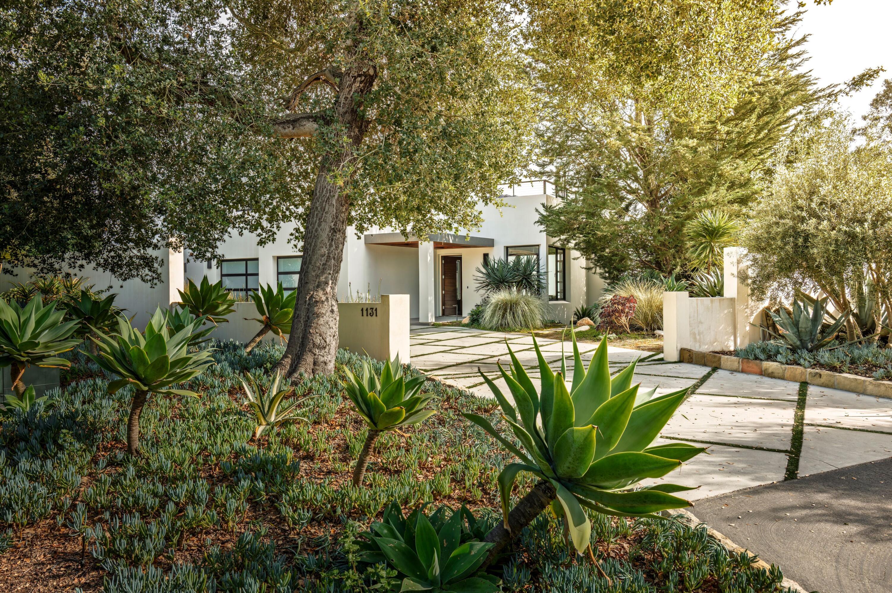 1131 Las Alturas Road, Unit A Santa Barbara, CA 93103 - Photo 4 of 47 3. Front Entry with Oak Tree and Tropica