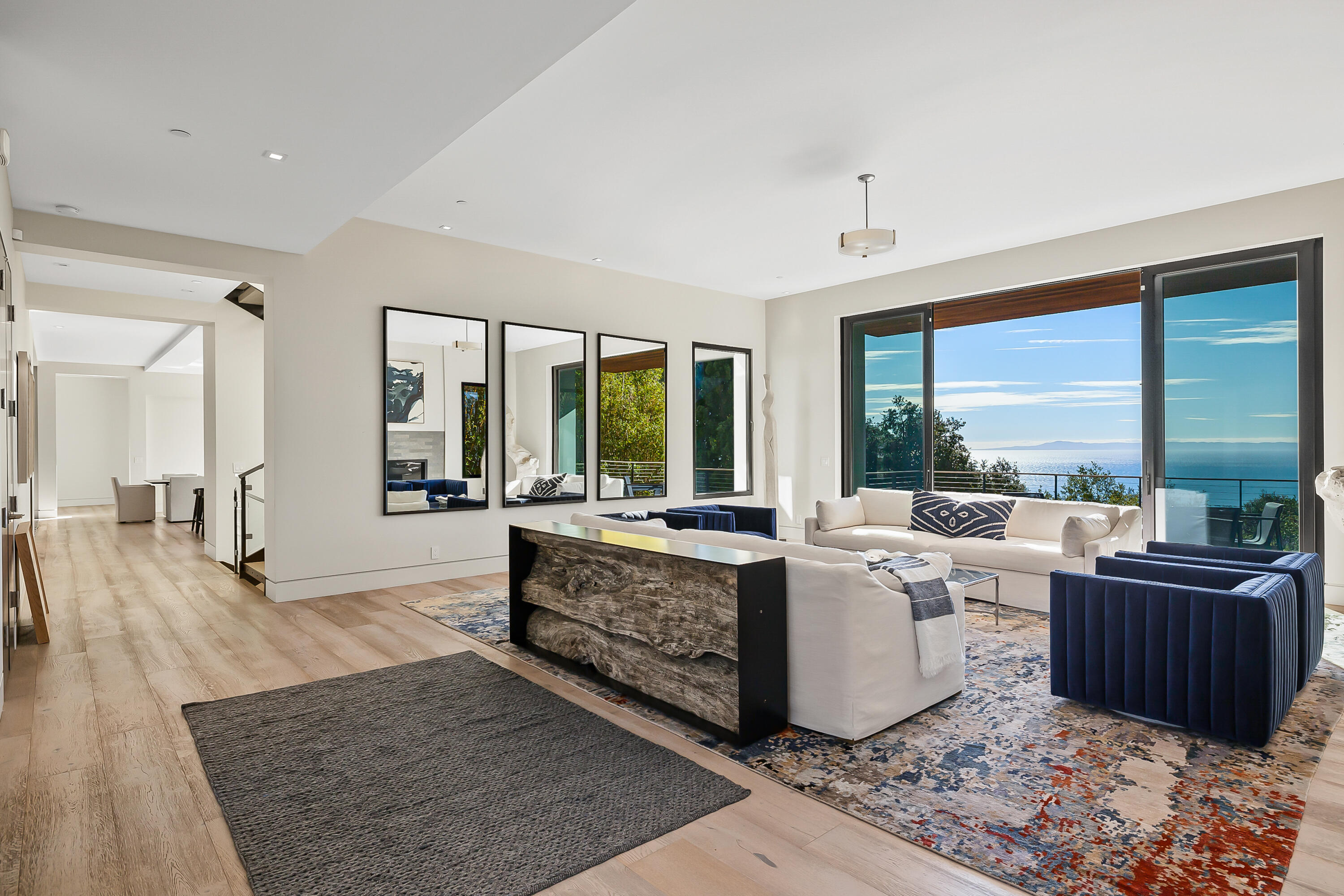 1131 Las Alturas Road, Unit SHARE A Santa Barbara, CA 93103 - Photo 4 of 32 a living room with furniture and large windows
