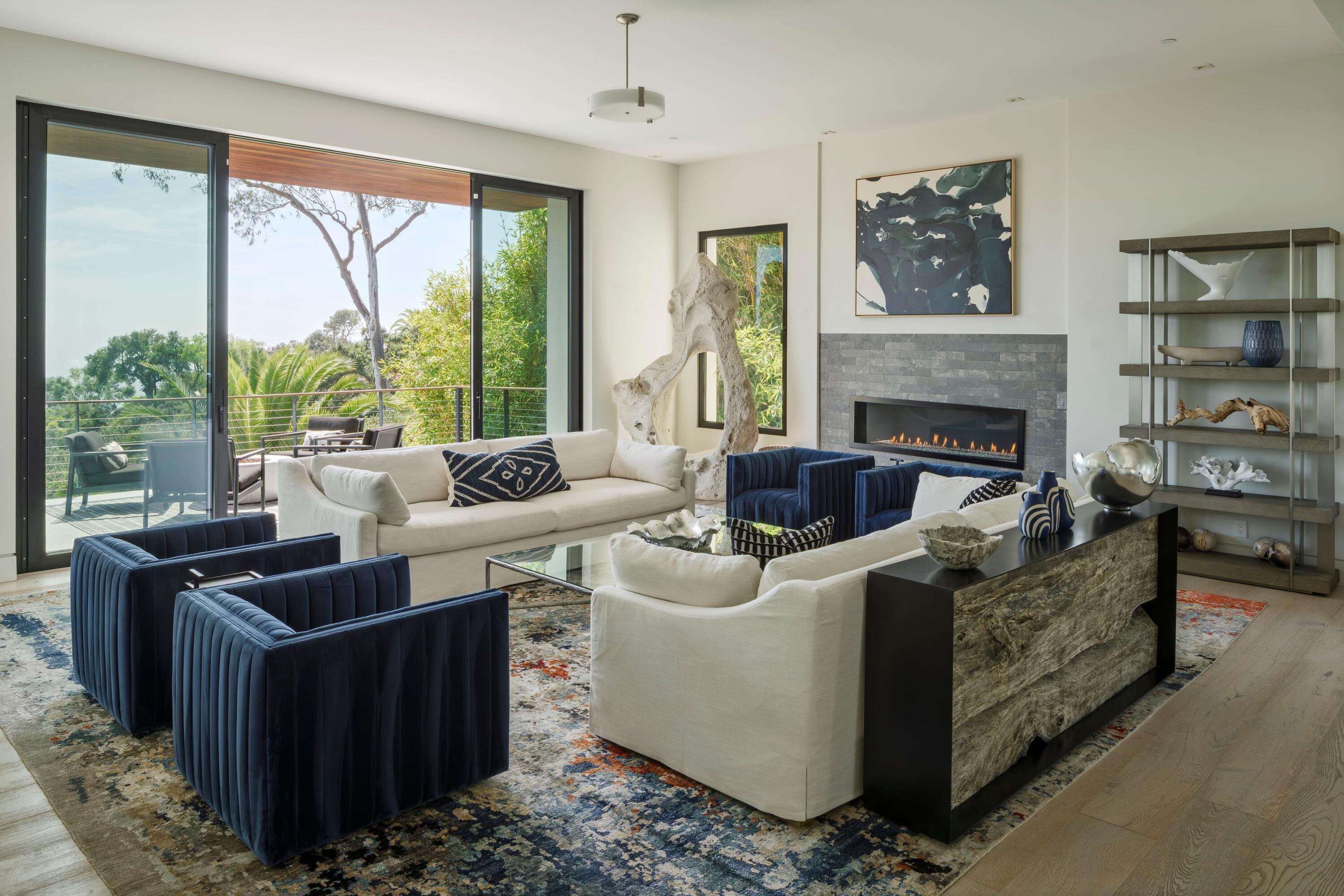 1131 Las Alturas Road, Unit A Santa Barbara, CA 93103 - Photo 9 of 47 a living room with furniture a large window and a fireplace