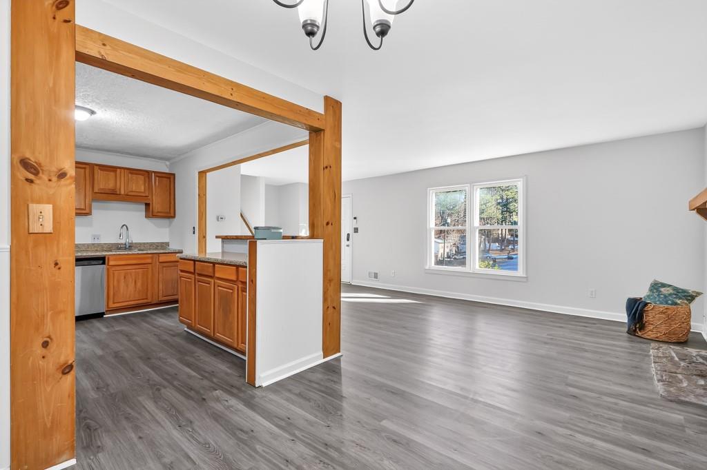 4703 North Springs Road Northwest Kennesaw, GA 30144 - Photo 11 of 35 a view of kitchen with wooden floor