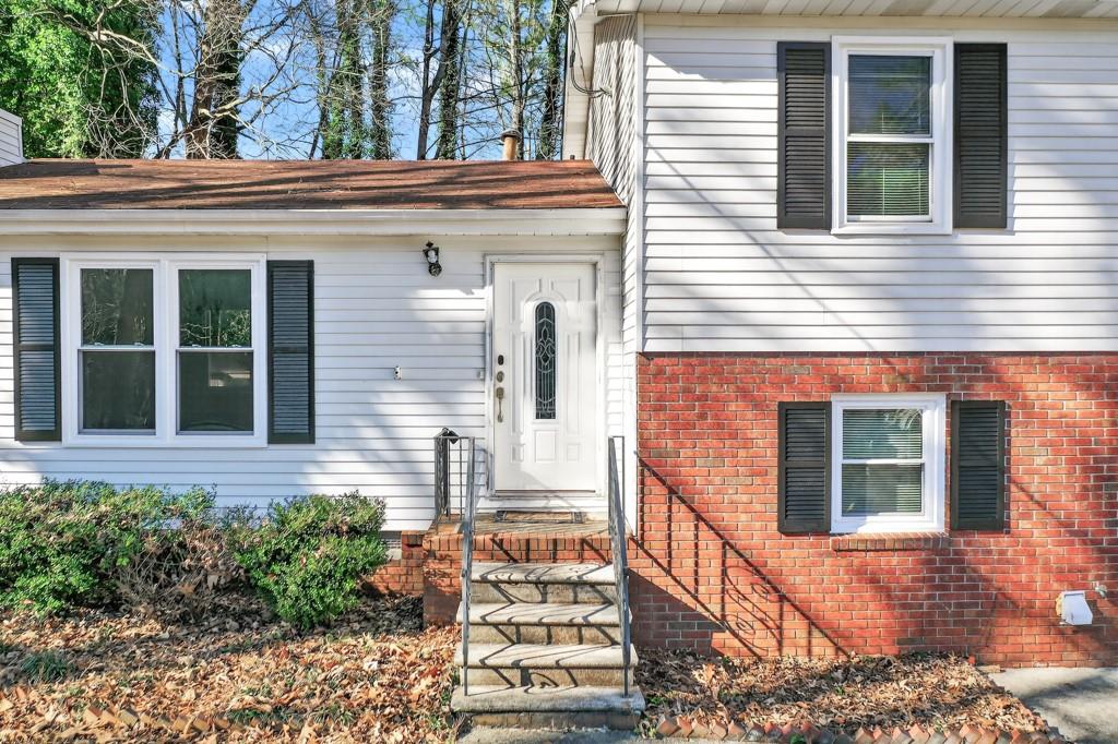 4703 North Springs Road Northwest Kennesaw, GA 30144 - Photo 2 of 35 front view of a house
