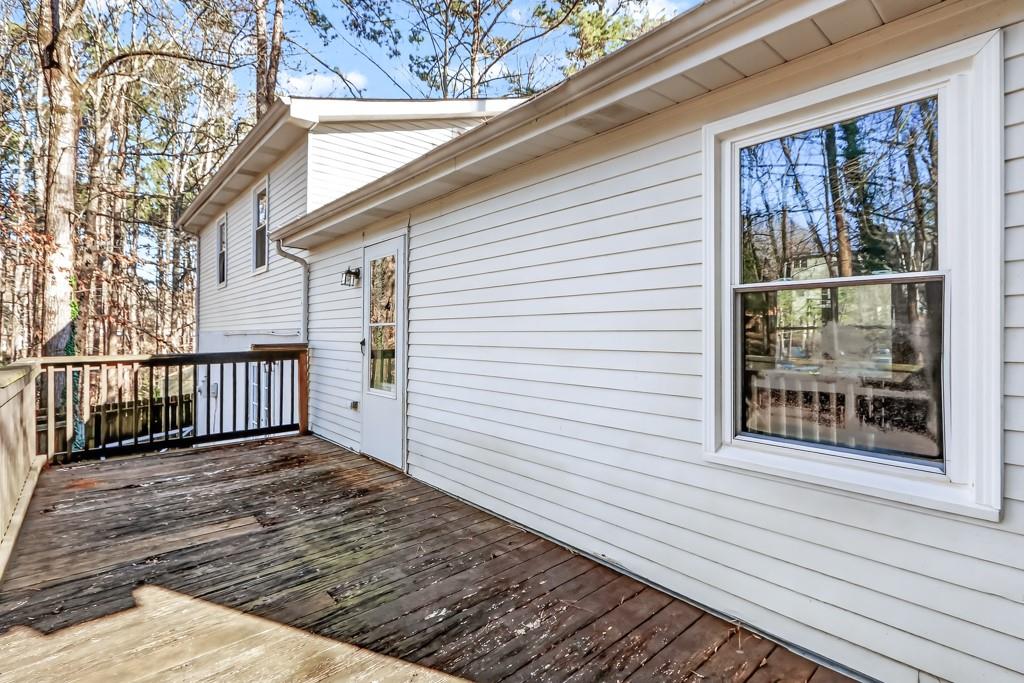 4703 North Springs Road Northwest Kennesaw, GA 30144 - Photo 34 of 35 a view of a wooden balcony